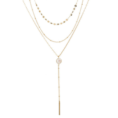 Multilayered gold necklace with pearl pendent